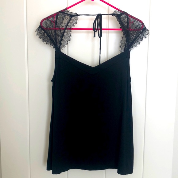 Anthropologie Tops - Anthropologie Black Top with Lace Sleeves